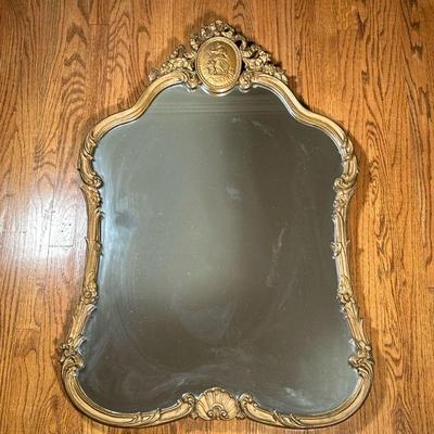 Ornate Brass-Plated Wall Mirror | Ornate brass-plated, wall-mount mirror with relief artwork at crest. Dimensions: h. 42 x w. 28 in
