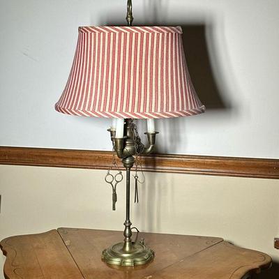 Faux Candelabra Brass Table Lamp | Brass 3-light candelabra (electrified) table lamp with attached tools and red-and-white pin-stripe...