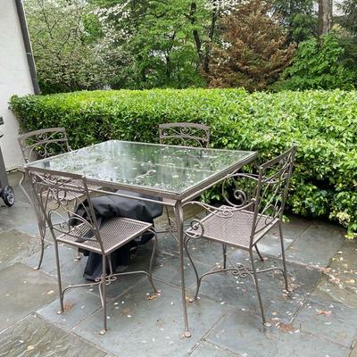 (5pc) Wrought Iron Dining Table & Chairs - Square | Wrought iron outdoor/patio furniture, including a square dining table with glass...