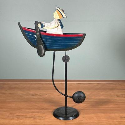 Kinetic Balance Rowboat item | Vintage (1950's) kinetic balance item of a sailor in a rowboat that rocks with counterweight. - h. 16...
