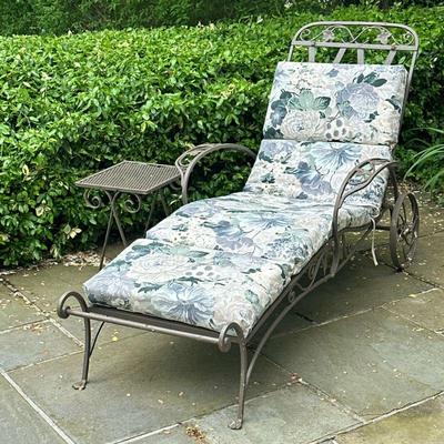 (2pc) Wrought Iron Chaise Lounge & Side Table | Wrought iron outdoor/patio furniture, including a small rectangular side table and a...