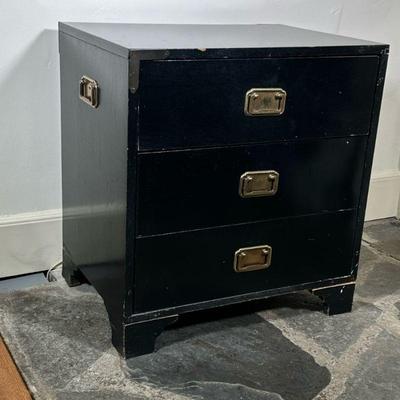 Black Painted Campaign Chest | Vintage (mid century) black painted footed campaign chest with three drawers and gold hardware....