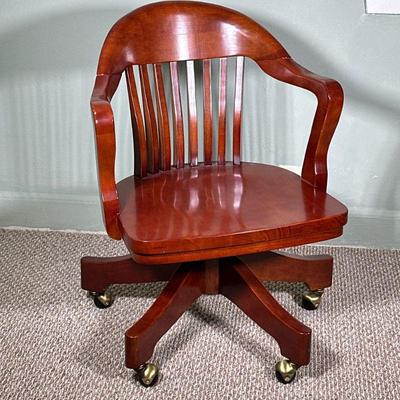 Wooden Banker's Swivel Chair | Vintage wooden banker's swivel chair with adjustable seat height. Dimensions: w. 23.5 x d. 20 in