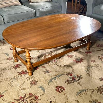 Ethan Allen Coffee Table With Drop Leaf | Ethan Allen honey-colored wooden coffee table with drop leaves. Overall depth: d. 38 - h. 17 x...