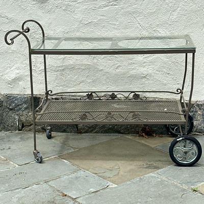 Wrought Iron Bar Cart | Wrought iron outdoor/patio bar cart on wheels, with a glass top insert, various openings on the top for serving...