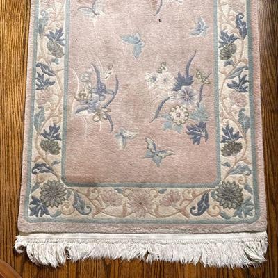 Rose-Colored Oriental Rug - Runner | Oriental runner rug (2' x 10') with blue florals atop a rose-colored base. - w. 27 x l....