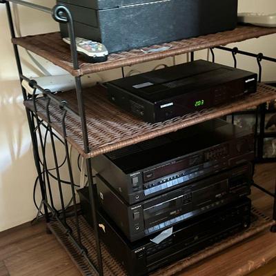 Wrought Iron & Wicker Shelving Unit | Wrought iron and wicker shelving unit or occasional table. - h. 32 x w. 27.5 x d. 18 in