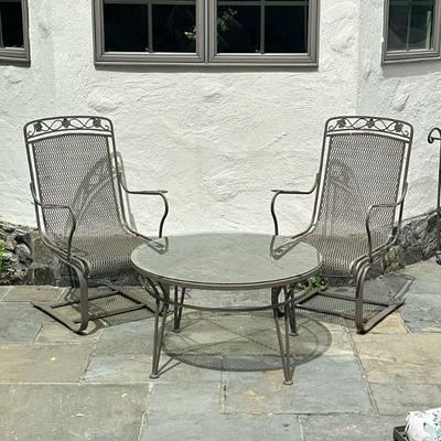 (3pc) PROBABLY WOODARD Wrought Iron Coffee Table & Rocking Chairs | Wrought iron outdoor/patio furniture, including a small round...