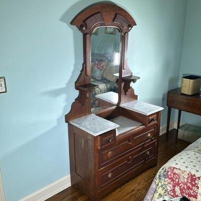 English (Victorian) Style Marble Top Dressing Table | Antique (possibly1800's) English (Victorian) Style walnut wooden drop-center...