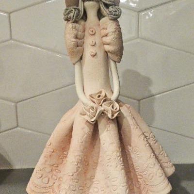 
Lady Figurine with Bonnet Delicate Terra Cotta