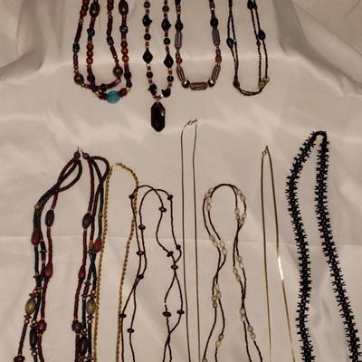 Brown Wood and Gold Tone Necklaces 
