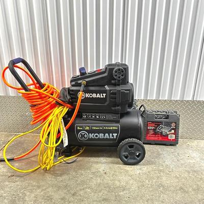 Kobalt Air Compressor with accessories.