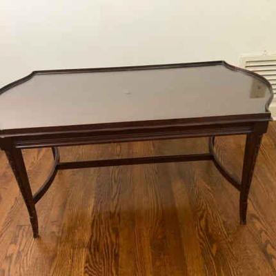 Vintage mahogony glass top stretcher coffee table