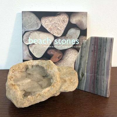 Jupiter marble geode & book on rocks
