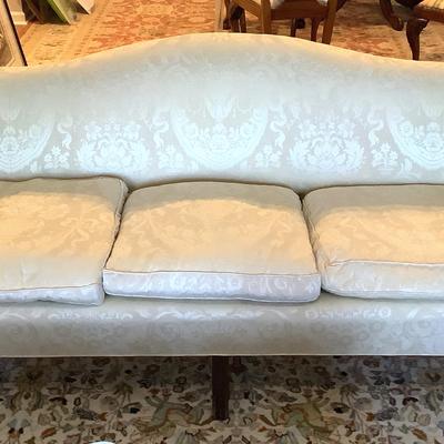 Classic Camel Back Sofa With Elegant Upholstery  