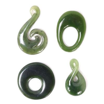 Lot 183 group of four chinese jade style pendants