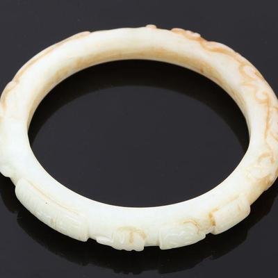 Lot 200 chinese white jade bangle dragon chasing flaming pearl