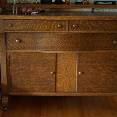 Excellent antique   oak sideboard 
original finish in very good condition