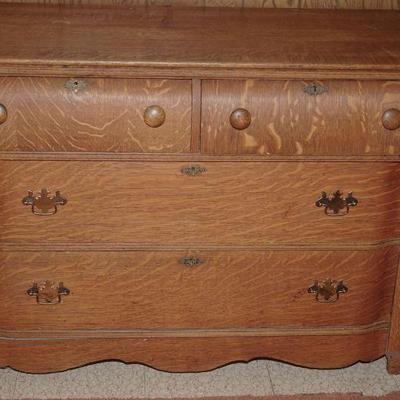 Early 1900's four drawer quarter sawn burea