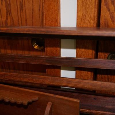 Antique wall shelf for plates.