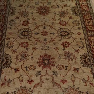 several various size area rugs 