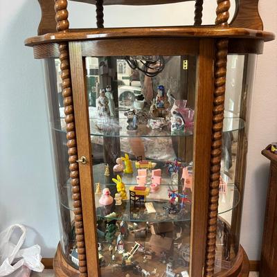 Large rounded cabinet with glass doors
