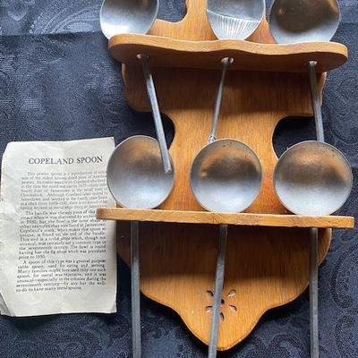 Copeland Spoon on wooden rack - $40