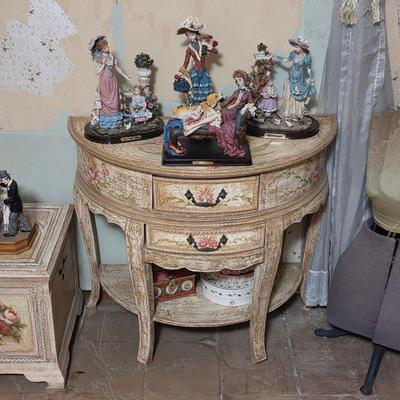 Victornia accent table with vintage figurines