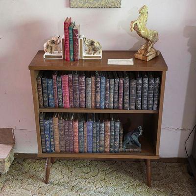 Mid century modern bookshelf and books