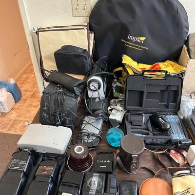 Sale Photo Thumbnail #69: Camera flashes, Polaroid 210, sunpak flash, canon battery charger, impact photography reflection disc