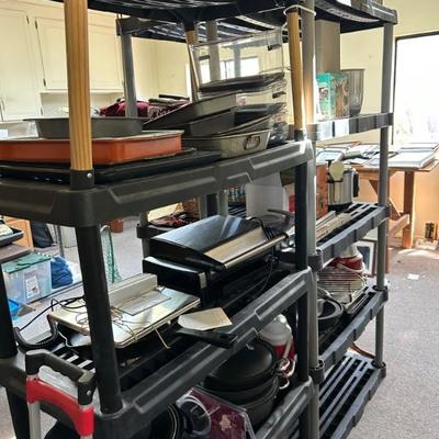 Plastic racks, small kitchen appliances, little grill, 