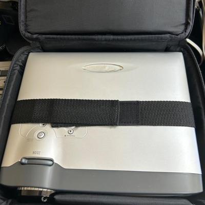 Optoma EP745 projector in a carrying case