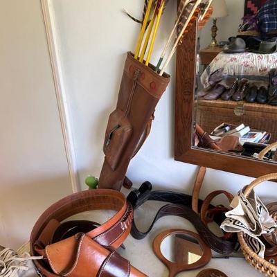 holster, leather quiver and arrows, mirror