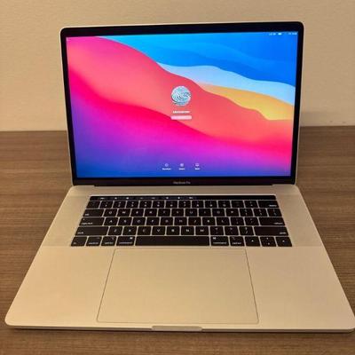 Apple MacBook Pro 15” w/ Touch Bar + Charger – C02YF0NLJGH7	