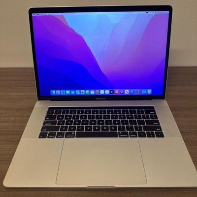 Apple MacBook Pro 15” w/ Touch Bar + Charger - C02SP0R7H040	
