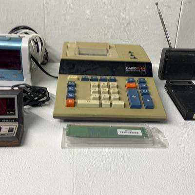 Vintage Electronics: Sony & Toshiba Radios, Spartus Clock, Nova XR5000 Stun Gun, Casio Calculator