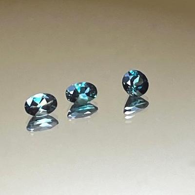 Green Labradorite Suite: 3 Gemstones- Two 6x4mm .40ct each Ovals and Round 5mm .45ct