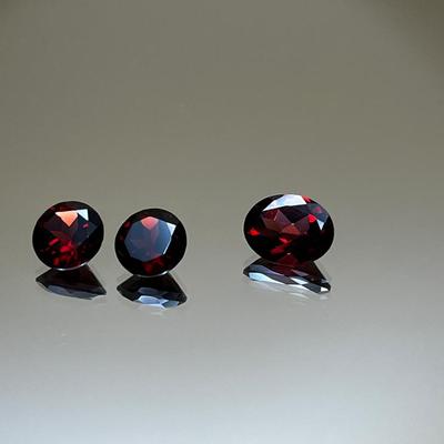 Mozambique Garnet Pair 4.35ct 8mm and Oval Red Garnet 2.75ct 8x6mm