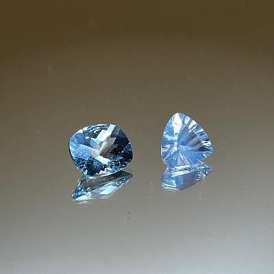 Blue Topaz 4.10ct 10x8mm Cushion and Blue Moon Quartz 3.10ct Triangle