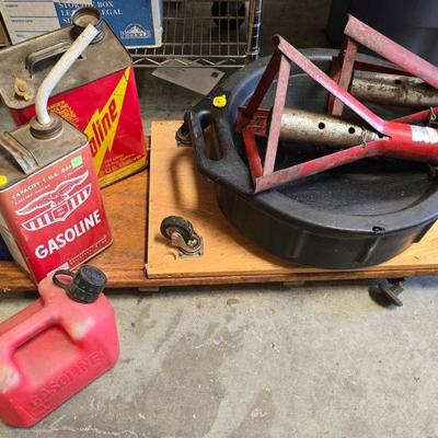 Lot #199 Two Creepers, Two Jacks, Plastic Oil Drip Pan, and 3 Gas Cans
