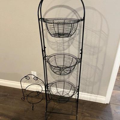KITCHEN ITEMS LIKE THIS NICE STANDING FRUIT BASKETS.