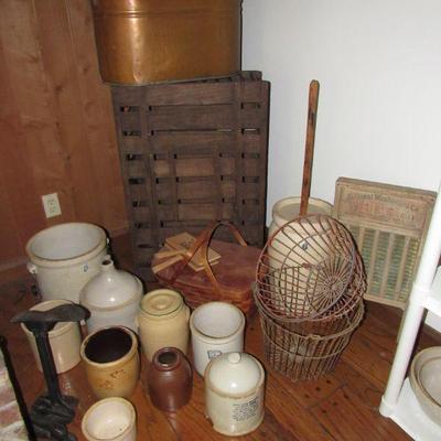 Several good crocks, jugs, butter churn, wire egg baskets, wood chicken carrier/coup and more!