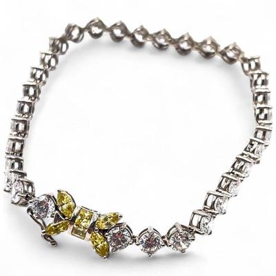 14K White Gold Bracelet with Bow-Shaped Yellow and Clear Stones