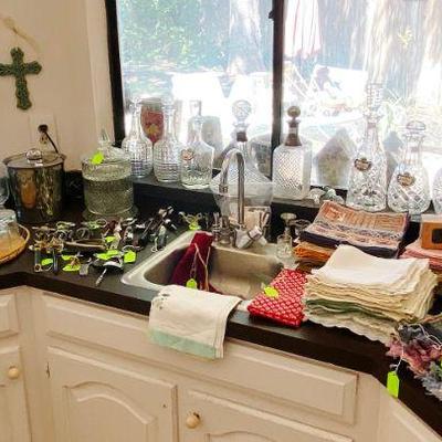 Bar Area filled with crystal decanters, accessories, placemats and napkins