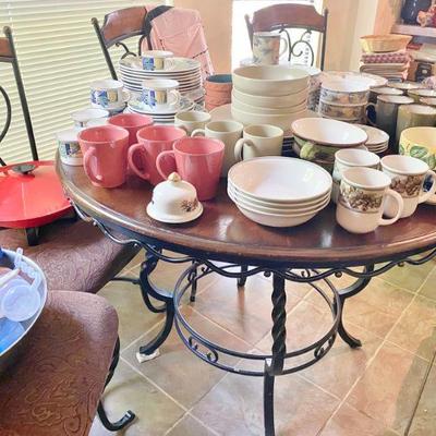 kitchen table round with iron base and trim, 4 chairs