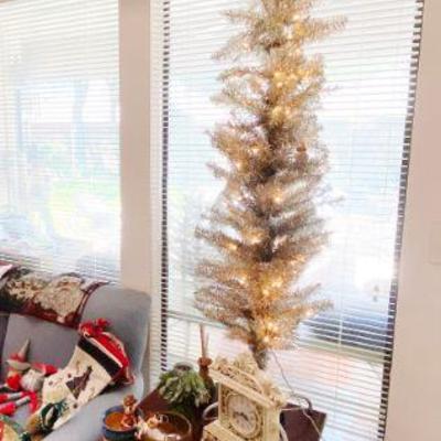 silver aluminum skinny tree with lights