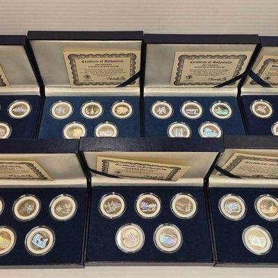 #1508 • (7) Hologram Statehood Quarter Dollars Collection
