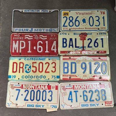 #2206 • (7) License Plates & (1) License Plate Cover
