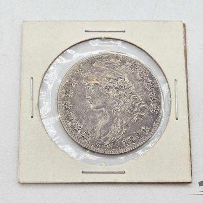 #1450 • 1834 Capped Bust Half Dollar Coin
