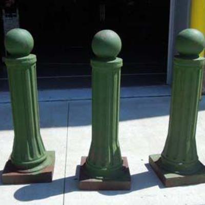 GROUP OF FIVE VINTAGE HAND PAINTED CAST IRON POSTS